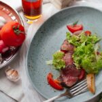 바쁜 직장인도 실천할 수 있는 건강 루틴, 어떻게 시작할까? meat with sliced vegetables on plate